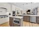 Spacious kitchen with stainless steel appliances, double islands, and hardwood floors at 141 Castle Dr, Mooresville, NC 28117