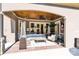 Covered patio featuring overhead lighting, ceiling fan, comfortable seating, and a decorative outdoor rug at 141 Castle Dr, Mooresville, NC 28117