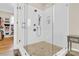 Modern bathroom with a glass-enclosed shower and pebble-stone shower floor at 141 Castle Dr, Mooresville, NC 28117