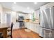 Well-appointed kitchen with stainless steel appliances, ample cabinet space, and a functional layout for cooking at 1489 L R Schronce Ln, Iron Station, NC 28080
