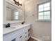 Bright bathroom featuring a double vanity, large mirror, and ample counter space at 1529 Covenant Pl, Rock Hill, SC 29732