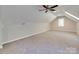 Large bonus room featuring neutral carpet, ample space, and natural light from a window providing versatile space at 1529 Covenant Pl, Rock Hill, SC 29732