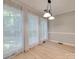 Inviting dining area with large windows and elegant lighting, creating a bright and airy atmosphere at 1529 Covenant Pl, Rock Hill, SC 29732