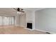 Spacious living room featuring hardwood floors, a fireplace, and natural light at 1529 Covenant Pl, Rock Hill, SC 29732