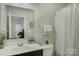 Clean bathroom featuring a large mirror, modern fixtures, and ample counter space at 17537 Caddy Ct, Charlotte, NC 28278