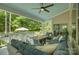 Inviting covered deck with plush seating and a fire table, perfect for outdoor entertaining at 17537 Caddy Ct, Charlotte, NC 28278