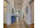 Stunning foyer with hardwood floors, soaring ceilings, and a view into the living spaces at 17537 Caddy Ct, Charlotte, NC 28278