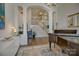 Elegant living room featuring high ceilings, hardwood floors, and a grand piano at 17537 Caddy Ct, Charlotte, NC 28278