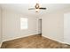 Bright bedroom with wood flooring, a window, and a ceiling fan at 201 Killian Cir, Clover, SC 29710