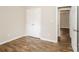 A well-lit bedroom features a closet, wood flooring, and a modern paint scheme at 201 Killian Cir, Clover, SC 29710