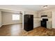 The kitchen features gray painted cabinets, ample counter space, and modern appliances at 201 Killian Cir, Clover, SC 29710