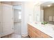 Bathroom view highlighting double sinks and access to an adjacent bedroom at 2019 Heirloom Ct, Matthews, NC 28104