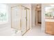 Bright bathroom featuring a glass-enclosed shower, tub, and tiled floors at 2019 Heirloom Ct, Matthews, NC 28104