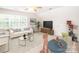 Versatile bonus room featuring comfortable seating, entertainment setup, and kid-friendly play area at 2019 Heirloom Ct, Matthews, NC 28104