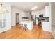 Spacious kitchen with a large island, stainless steel appliances, and granite countertops at 2019 Heirloom Ct, Matthews, NC 28104