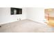 Bright room with carpet and TV hookups ready at 2019 Heirloom Ct, Matthews, NC 28104