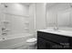 Bright bathroom featuring a shower-tub combo and sleek vanity with modern fixtures at 231 Cotton Ridge Pl, Rock Hill, SC 29730
