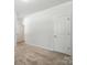 Neutral-toned bedroom with door access and comfortable carpeting at 231 Cotton Ridge Pl, Rock Hill, SC 29730