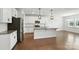 Modern kitchen featuring white cabinetry, granite countertops, and stainless steel appliances at 231 Cotton Ridge Pl, Rock Hill, SC 29730