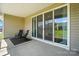 Spacious screened-in patio with sliding doors, perfect for outdoor living at 231 Cotton Ridge Pl, Rock Hill, SC 29730