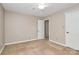 Bedroom featuring carpet, a ceiling fan and two doors at 3304 Chilham Pl, Charlotte, NC 28226