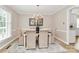 Traditional dining room with chandelier, seating for six, and elegant decor at 3304 Chilham Pl, Charlotte, NC 28226