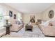 Comfortable living room with sofas, area rug, and bright natural light at 3304 Chilham Pl, Charlotte, NC 28226