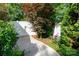 This backyard is lush and private thanks to beautiful greenery and a tall privacy fence at 405 Jenny Skip Ln, Rock Hill, SC 29732
