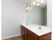 Bathroom with double sink vanity, large mirror, and ample lighting at 405 Jenny Skip Ln, Rock Hill, SC 29732
