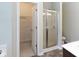 Bathroom features a walk-in closet and a shower with glass door at 405 Jenny Skip Ln, Rock Hill, SC 29732