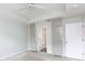 Bright bedroom featuring neutral walls, carpet, ceiling fan, and built-in storage cabinets at 405 Jenny Skip Ln, Rock Hill, SC 29732