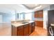 Open-concept kitchen with breakfast bar, stainless steel appliances, and hardwood floors at 405 Jenny Skip Ln, Rock Hill, SC 29732