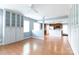 Inviting living room featuring hardwood floors, neutral paint, and seamless access to the kitchen at 405 Jenny Skip Ln, Rock Hill, SC 29732