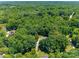 Lush residential neighborhood featuring mature trees and well-manicured lawns at 413 Farm Branch Dr, Fort Mill, SC 29715