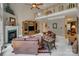 Open living room features fireplace, vaulted ceilings, and a view of the upper level at 413 Farm Branch Dr, Fort Mill, SC 29715