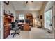 Inviting home office with built-in desk, shelving, and natural light at 413 Farm Branch Dr, Fort Mill, SC 29715