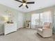 Cozy bedroom with neutral tones, a glider, and a sunlit window at 4261 Coachwhip Ave, Lancaster, SC 29720