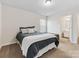 Comfortable bedroom with a cozy bed, neutral walls, and an ensuite bathroom at 4261 Coachwhip Ave, Lancaster, SC 29720