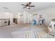 Open concept bonus room featuring a staircase and a play area at 4261 Coachwhip Ave, Lancaster, SC 29720