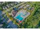 Aerial view of the community pool, clubhouse, and playground amenities, perfect for Gathering fun at 4261 Coachwhip Ave, Lancaster, SC 29720