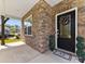 Inviting entryway with stone accents, a decorative wreath, and a welcoming doormat at 4261 Coachwhip Ave, Lancaster, SC 29720