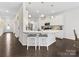 Kitchen island with pendant lighting and seating, overlooking the dining and living areas at 4261 Coachwhip Ave, Lancaster, SC 29720