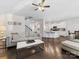 Spacious open-concept living area with hardwood floors seamlessly connects to the modern kitchen and dining space at 4261 Coachwhip Ave, Lancaster, SC 29720