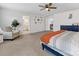 Large main bedroom showcasing a stylish chair and ensuite bathroom access at 4261 Coachwhip Ave, Lancaster, SC 29720