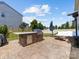 Large patio with outdoor kitchen, BBQ grill, and comfortable outdoor seating at 4261 Coachwhip Ave, Lancaster, SC 29720