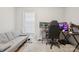 Bedroom with plush carpeting, neutral walls, natural light, a large desk and a couch at 432 English Ivy Ct, Fort Mill, SC 29715