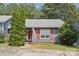 Charming single-story home with red shutters, inviting front yard and mature trees at 432 English Ivy Ct, Fort Mill, SC 29715