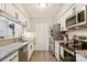 Bright kitchen featuring granite countertops, stainless steel appliances, and ample cabinet space at 432 English Ivy Ct, Fort Mill, SC 29715