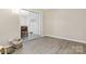 Bright living room features hardwood floors and sliding glass doors leading to the outside at 432 English Ivy Ct, Fort Mill, SC 29715