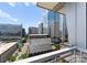Balcony view showcasing the city skyline, highlighting the building's prime location at 435 S Tryon St # 907, Charlotte, NC 28202